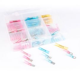 A transparent assortmentbox containing crimp terminals with heat shrink tubing, 110 pieces, with crimp terminals in the colors blue, white and yellow.